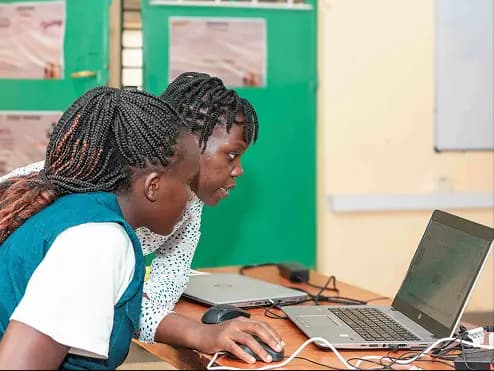 Students learning at NairoBits